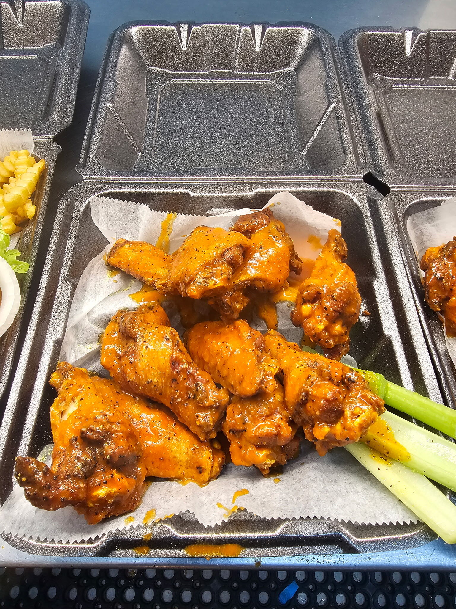 Crispy halal chicken wings with sauce from The Mumin's Wing House